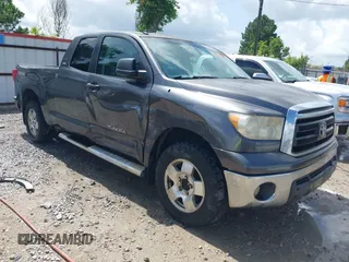 2011 Toyota Tundra with VIN 5TFRM5F13BX022335, listed as a IAAI auction lot 42519780 with 236,725 mi miles and . Bid and sale history available at DreamBid. Image 1.
