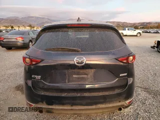 2018 Mazda CX-5 Grand Touring with VIN JM3KFBDM9J1326933, listed as a Copart auction lot 82180164 with 99,574 mi miles and Salvage title. Bid and sale history available at DreamBid. Image 6.