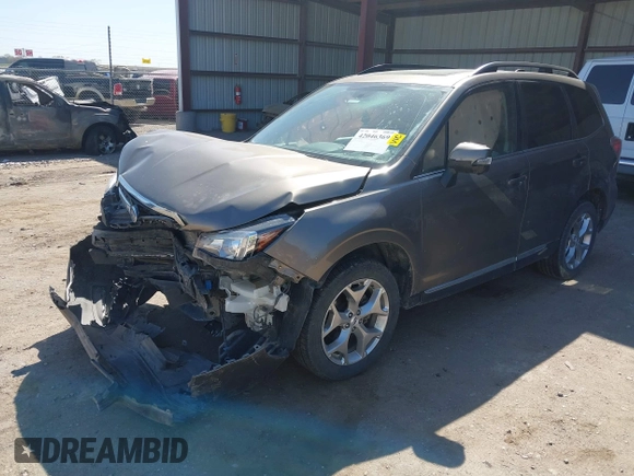 2017 Subaru Forester Touring z VIN JF2SJAWC8HH582683, wystawiony jako IAAI lot #42046369 z przebiegiem 71 070 mil mil oraz . Historia ofert i sprzedaży dostępna na DreamBid. Obrazek 16.