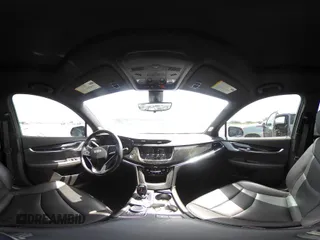 2021 Cadillac XT6 Premium Luxury z VIN 1GYKPCRS8MZ233209, wystawiony jako IAAI lot #40012714 z przebiegiem 45 599 mil mil oraz . Historia ofert i sprzedaży dostępna na DreamBid. Obrazek 19.