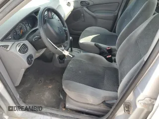 2003 Ford Focus LX с VIN 1FAFP33P63W187283, выставлен на аукционе Copart как лот 48803575 с пробегом Не указан миль и Списание • Salvage title. История ставок и продаж доступна на DreamBid. Изображение 7.