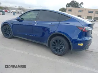 2022 Tesla Model Y Long Range with VIN 7SAYGDEE6NF480146, listed as a IAAI auction lot 41906361 with 31,939 mi miles and . Bid and sale history available at carsss.com. Image 3.