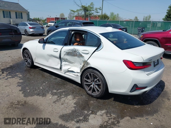 2019 BMW 3 Series 330i xDrive with VIN WBA5R7C54KAJ79214, listed as a IAAI auction lot 42001361 with 103,265 mi miles. Bid and sale history available at carsss.com. Image 3.