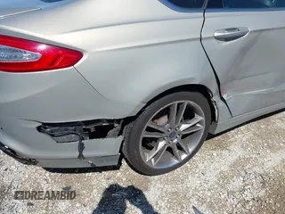 2015 Ford Fusion Titanium with VIN 3FA6P0D91FR236699, listed as a IAAI auction lot 41977478 with 203,394 mi miles. Bid and sale history available at carsss.com. Image 6.