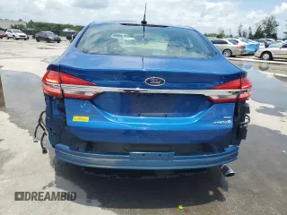2017 Ford Fusion Hybrid SE z VIN 3FA6P0LU6HR319103, wystawiony jako Copart lot #58494695 z przebiegiem 104 483 mil mil oraz Szkoda całkowita • Salvage title. Historia ofert i sprzedaży dostępna na DreamBid. Obrazek 6.