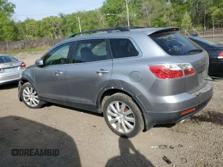 2010 Mazda CX-9 Grand Touring z VIN JM3TB3MA9A0220094, wystawiony jako Copart lot #53611025 z przebiegiem 163 870 mil mil oraz Szkoda całkowita • Salvage title. Historia ofert i sprzedaży dostępna na DreamBid. Obrazek 2.