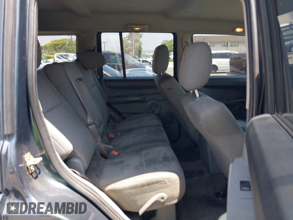 2007 Jeep Commander Sport with VIN 1J8HH48KX7C548033, listed as a IAAI auction lot 42555217 with 213,236 mi miles and . Bid and sale history available at DreamBid. Image 8.