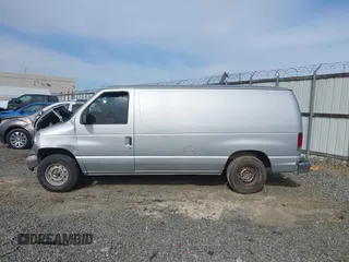 1998 Ford Econoline Cargo with VIN 1FTRE1428WHB30628, listed as a IAAI auction lot 41706164 with 153,223 mi miles. Bid and sale history available at carsss.com. Image 14.