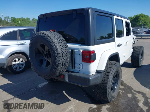 2018 Jeep Wrangler Unlimited Sahara z VIN 1C4HJXEG4JW106111, wystawiony jako IAAI lot #41994833 z przebiegiem 99 583 mil mil oraz . Historia ofert i sprzedaży dostępna na DreamBid. Obrazek 4.