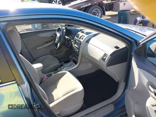 2013 Toyota Corolla L with VIN 5YFBU4EE2DP127014, listed as a IAAI auction lot 41729189 with 156,673 mi miles. Bid and sale history available at carsss.com. Image 5.