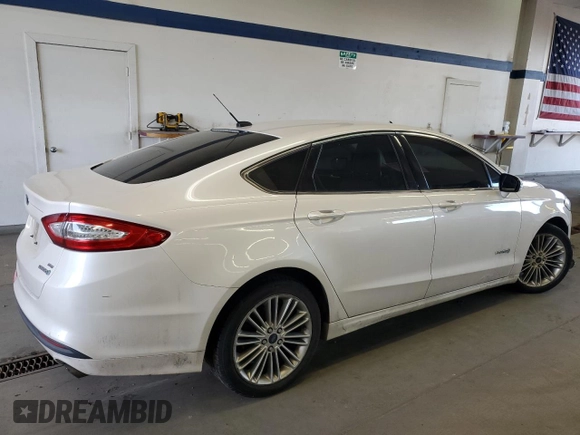 2014 Ford Fusion SE Hybrid with VIN 3FA6P0LU7ER349951, listed as a Copart auction lot 48247925 with 197,441 mi miles and Salvage Title. Bid and sale history available at DreamBid. Image 3.
