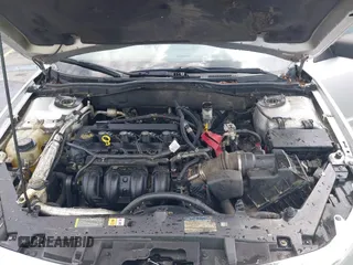2012 Ford Fusion S with VIN 3FAHP0GAXCR270957, listed as a IAAI auction lot 42122294 with 230,489 mi miles and . Bid and sale history available at carsss.com. Image 10.