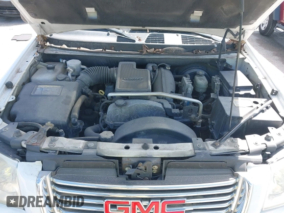 2006 GMC Envoy SLE with VIN 1GKDT13SX62258586, listed as a IAAI auction lot 42045967 with 143,225 mi miles. Bid and sale history available at carsss.com. Image 10.