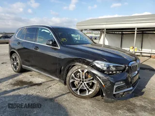 2021 BMW X5 xDrive45e with VIN 5UXTA6C09M9E08945, listed as a Copart auction lot 65677632 with 0 mi miles. Bid and sale history available at carsss.com. Image 1.