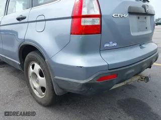 2007 Honda CR-V LX with VIN JHLRE48317C057561, listed as a IAAI auction lot 42119266 with 307,373 mi miles. Bid and sale history available at carsss.com. Image 13.