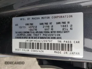 2016 Mazda 3 S Touring with VIN JM1BM1M3XG1299797, listed as a Copart auction lot 54344485 with Not provided miles and Salvage title. Bid and sale history available at DreamBid. Image 12.