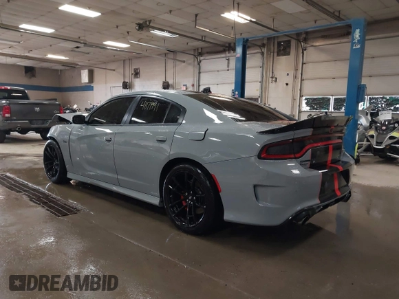 2021 Dodge Charger Scat Pack Widebody with VIN 2C3CDXGJ4MH540627, listed as a IAAI auction lot 41171991 with 31,394 mi miles and . Bid and sale history available at DreamBid. Image 3.