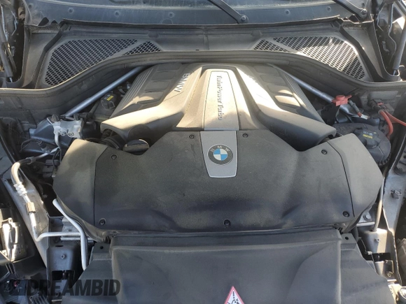 2016 BMW X6 xDrive50i z VIN 5UXKU6C57G0R33958, wystawiony jako Copart lot #49774065 z przebiegiem 124 226 mil mil oraz Szkoda całkowita • Salvage title. Historia ofert i sprzedaży dostępna na DreamBid. Obrazek 12.