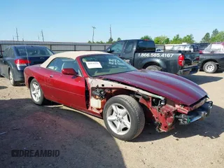 1997 Jaguar XK with VIN SAJGX2748VC011754, listed as a IAAI auction lot 41979459 with 34,601 mi miles and . Bid and sale history available at DreamBid. Image 1.