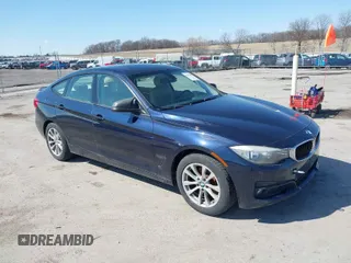 2014 BMW 3 Series 328i Gran Turismo xDrive z VIN WBA3X5C51ED557333, wystawiony jako IAAI lot #41879900 z przebiegiem 101 737 mil mil oraz . Historia ofert i sprzedaży dostępna na DreamBid. Obrazek 1.