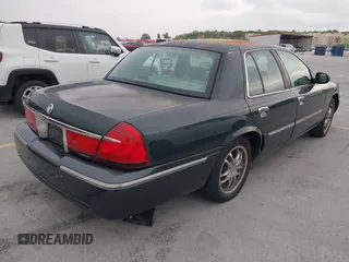 2002 Mercury Grand Marquis LS Premium z VIN 2MEFM75WX2X626520, wystawiony jako IAAI lot #42374203 z przebiegiem 139 692 mil mil oraz . Historia ofert i sprzedaży dostępna na DreamBid. Obrazek 4.