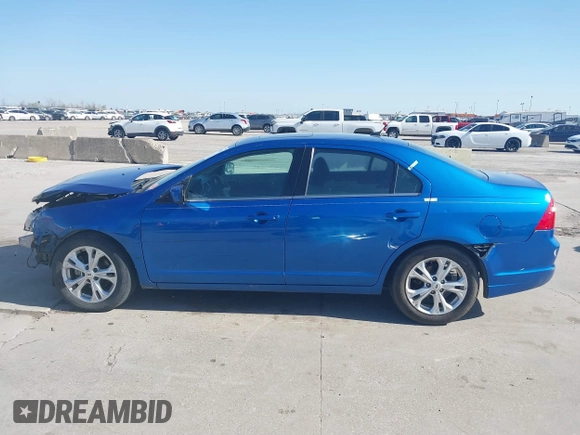 2012 Ford Fusion SE z VIN 3FAHP0HA9CR395009, wystawiony jako IAAI lot #41855650 z przebiegiem 178 901 mil mil oraz . Historia ofert i sprzedaży dostępna na DreamBid. Obrazek 15.