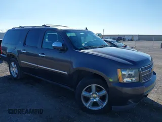 2011 Chevrolet Suburban LTZ with VIN 1GNSKKE30BR265556, listed as a IAAI auction lot 41551093 with 230,056 mi miles. Bid and sale history available at carsss.com. Image 1.