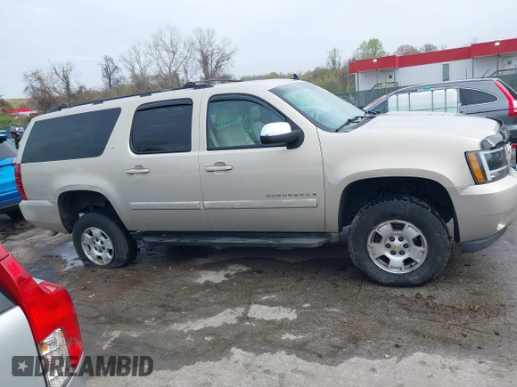 2007 Chevrolet Suburban LT with VIN 3GNFK16387G267959, listed as a IAAI auction lot 41999489 with 106,131 mi miles. Bid and sale history available at carsss.com. Image 13.