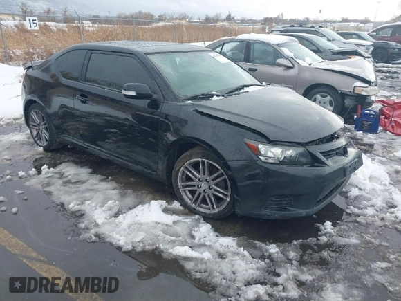 2013 Scion tC with VIN JTKJF5C72D3055801, listed as a IAAI auction lot 41102753 with 242,146 mi miles. Bid and sale history available at carsss.com. Image 1.