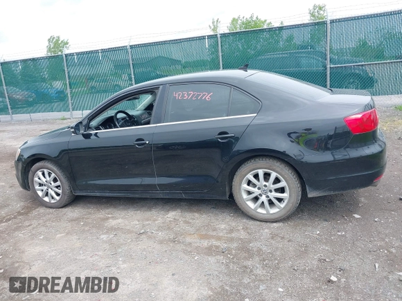2013 Volkswagen Jetta SE z VIN 3VWDX7AJ5DM258429, wystawiony jako IAAI lot #42372776 z przebiegiem 211 579 mil mil oraz . Historia ofert i sprzedaży dostępna na DreamBid. Obrazek 14.