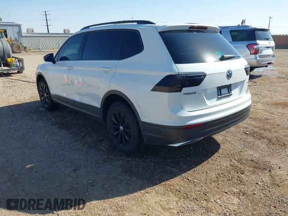 2018 Volkswagen Tiguan S with VIN 3VV0B7AX8JM076693, listed as a IAAI auction lot 42044886 with 109,660 mi miles and . Bid and sale history available at DreamBid. Image 3.