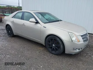 2009 Cadillac CTS RWD z VIN 1G6DF577490142609, wystawiony jako IAAI lot #42378135 z przebiegiem 187 508 mil mil oraz . Historia ofert i sprzedaży dostępna na DreamBid. Obrazek 1.