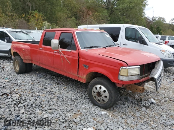 1996 Ford F-350 with VIN 1FTJW35F3TEB59586, listed as a Copart auction lot 79329304 with 199,054 mi miles and Salvage title. Bid and sale history available at DreamBid. Image 4.