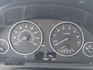 2015 BMW 3 Series 328i with VIN WBA3C1C52FK119339, listed as a IAAI auction lot 41549876 with 148,347 mi miles and . Bid and sale history available at carsss.com. Image 7.