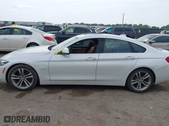 2019 BMW 4 Series 430i with VIN WBA4J1C53KBM14633, listed as a IAAI auction lot 42274320 with 70,460 mi miles and . Bid and sale history available at DreamBid. Image 14.