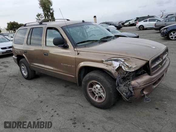 2000 Dodge Durango z VIN 1B4HR28Y4YF187411, wystawiony jako Copart lot #79060184 z przebiegiem 275 571 mil mil oraz Szkoda całkowita • Salvage title. Historia ofert i sprzedaży dostępna na DreamBid. Obrazek 4.