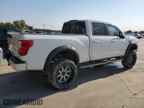 2016 Nissan Titan Platinum Reserve z VIN 1N6BA1F21GN513109, wystawiony jako Copart lot #64840434 z przebiegiem 94 263 mil mil oraz Czysty tytuł • Clean title. Historia ofert i sprzedaży dostępna na DreamBid. Obrazek 3.