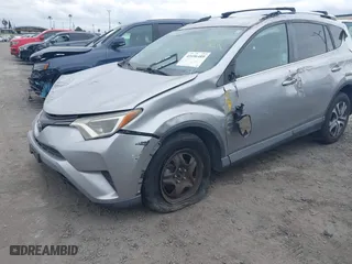 2016 Toyota RAV4 LE with VIN 2T3ZFREV2GW249128, listed as a IAAI auction lot 41696489 with 115,816 mi miles. Bid and sale history available at carsss.com. Image 2.