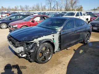 2020 Genesis G70 2.0T with VIN KMTG44LA2LU045244, listed as a Copart auction lot 74530703 with 64,352 mi miles and Salvage title. Bid and sale history available at DreamBid. Image 1.