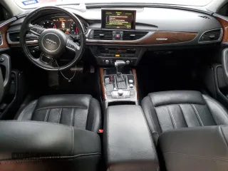 2015 Audi A6 3.0T Prestige with VIN WAUHGAFCXFN031884, listed as a Copart auction lot 41890843 with 136,077 mi miles. Bid and sale history available at carsss.com. Image 8.