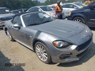 2017 FIAT 124 Spider Lusso with VIN JC1NFAEK6H0106689, listed as a IAAI auction lot 42427388 with 58,711 mi miles and . Bid and sale history available at DreamBid. Image 1.