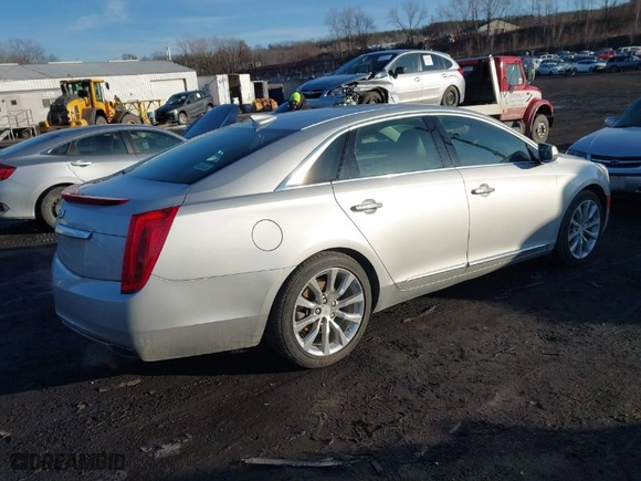 2016 Cadillac XTS Luxury Collection with VIN 2G61N5S36G9140048, listed as a IAAI auction lot 41541106 with 128,868 mi miles. Bid and sale history available at carsss.com. Image 4.