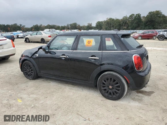 2021 MINI Hardtop 4 Door Oxford Edition with VIN WMWXU7C08M2N64039, listed as a Copart auction lot 83329254 with 31,549 mi miles and Non repairable. Bid and sale history available at DreamBid. Image 2.
