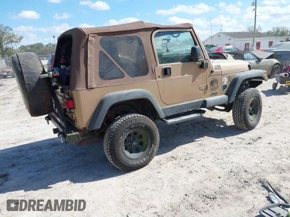 2000 Jeep Wrangler Sahara with VIN 1J4FA59S8YP763468, listed as a IAAI auction lot 41554183 with 182,922 mi miles. Bid and sale history available at carsss.com. Image 4.