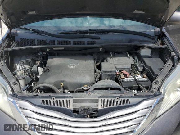2015 Toyota Sienna XLE with VIN 5TDYK3DCXFS668851, listed as a Copart auction lot 60452005 with 205,549 mi miles and Salvage title. Bid and sale history available at DreamBid. Image 12.