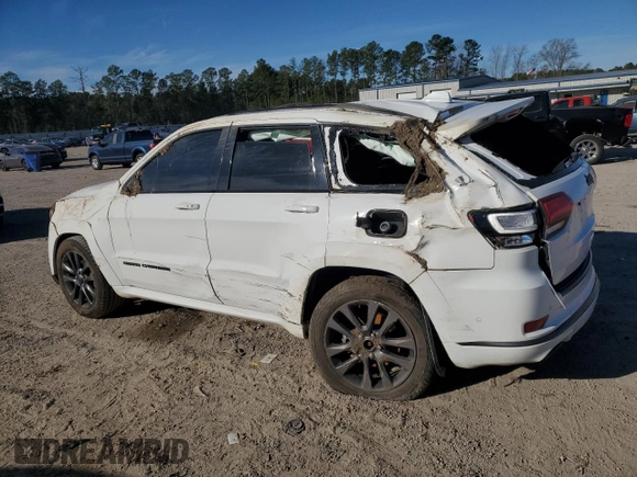 2018 Jeep Grand Cherokee High Altitude with VIN 1C4RJECG1JC125602, listed as a Copart auction lot 88702275 with 59,701 mi miles and Salvage title. Bid and sale history available at DreamBid. Image 2.