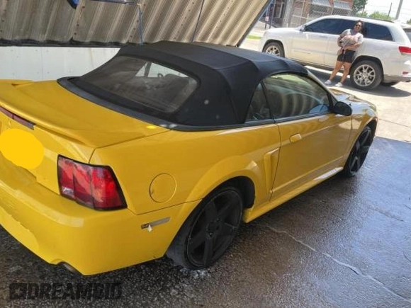 1999 Ford Mustang GT with VIN 1FAFP45X7XF114772, listed as a Copart auction lot 56733905 with 233,015 mi miles and Clean title. Bid and sale history available at DreamBid. Image 4.