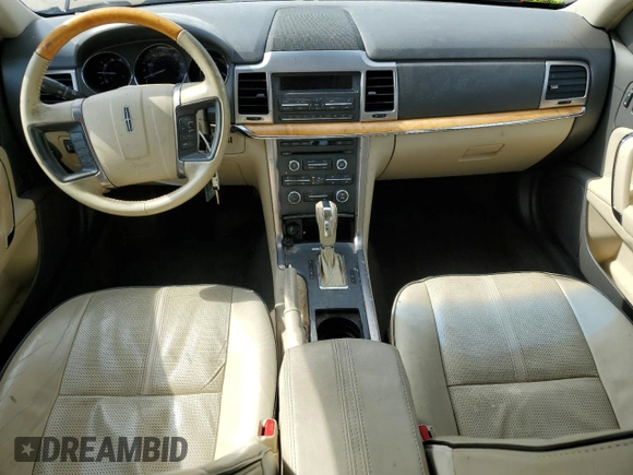 2011 Lincoln MKZ with VIN 3LNHL2JC0BR766629, listed as a Copart auction lot 56338015 with 118,728 mi miles and Salvage title. Bid and sale history available at DreamBid. Image 8.
