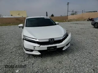 2019 Honda Clarity Touring z VIN JHMZC5F31KC004815, wystawiony jako Copart lot #43965655 z przebiegiem 29 821 mil mil oraz Szkoda całkowita • Salvage title. Historia ofert i sprzedaży dostępna na DreamBid. Obrazek 10.
