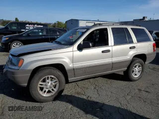 2003 Jeep Grand Cherokee with VIN 1J8GW48N43C593488, listed as a Copart auction lot 60466805 with 70,882 mi miles and Salvage title. Bid and sale history available at DreamBid. Image 1.